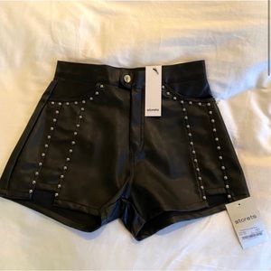 studded black leather shorts!!